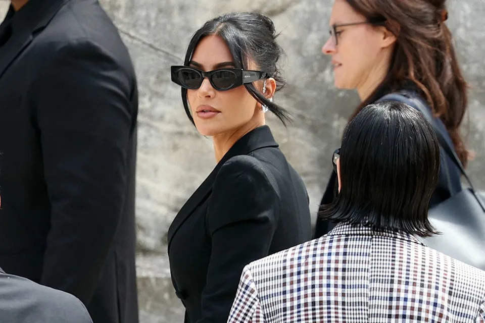 ALAIN JOCARD/AFP via Getty Kim Kardashian arrives to the Assize Court on May 13, 2025 to testify in the trial about her 2016 robbery