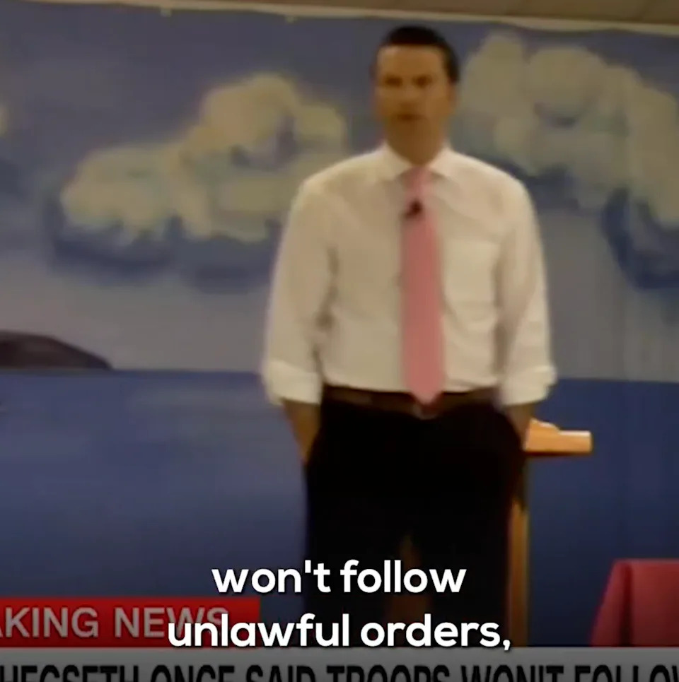 Blurry image of a man in business attire next to partially visible text on screen, related to news about refusing unlawful orders