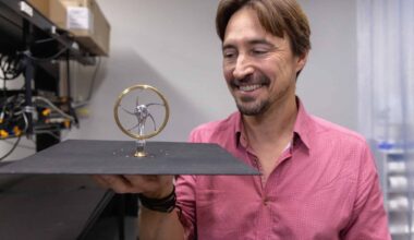 Image of the radiative engine for generating power at night being held by it's designer