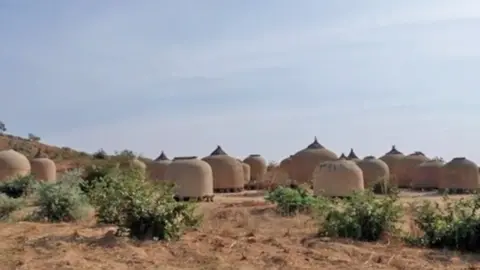 Gift Ufuoma/BBC Around 15 clay granaries in Nukuru 