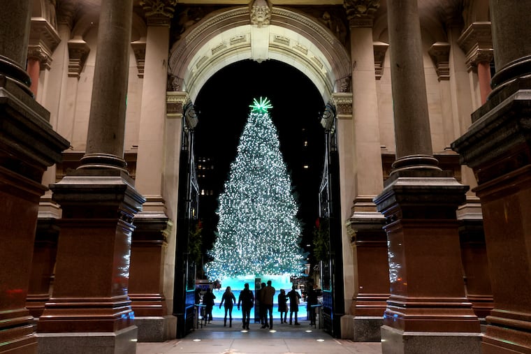 Philadelphia's Holiday Tree as see through the northern archway at City Hall on Dec. 12, 2024