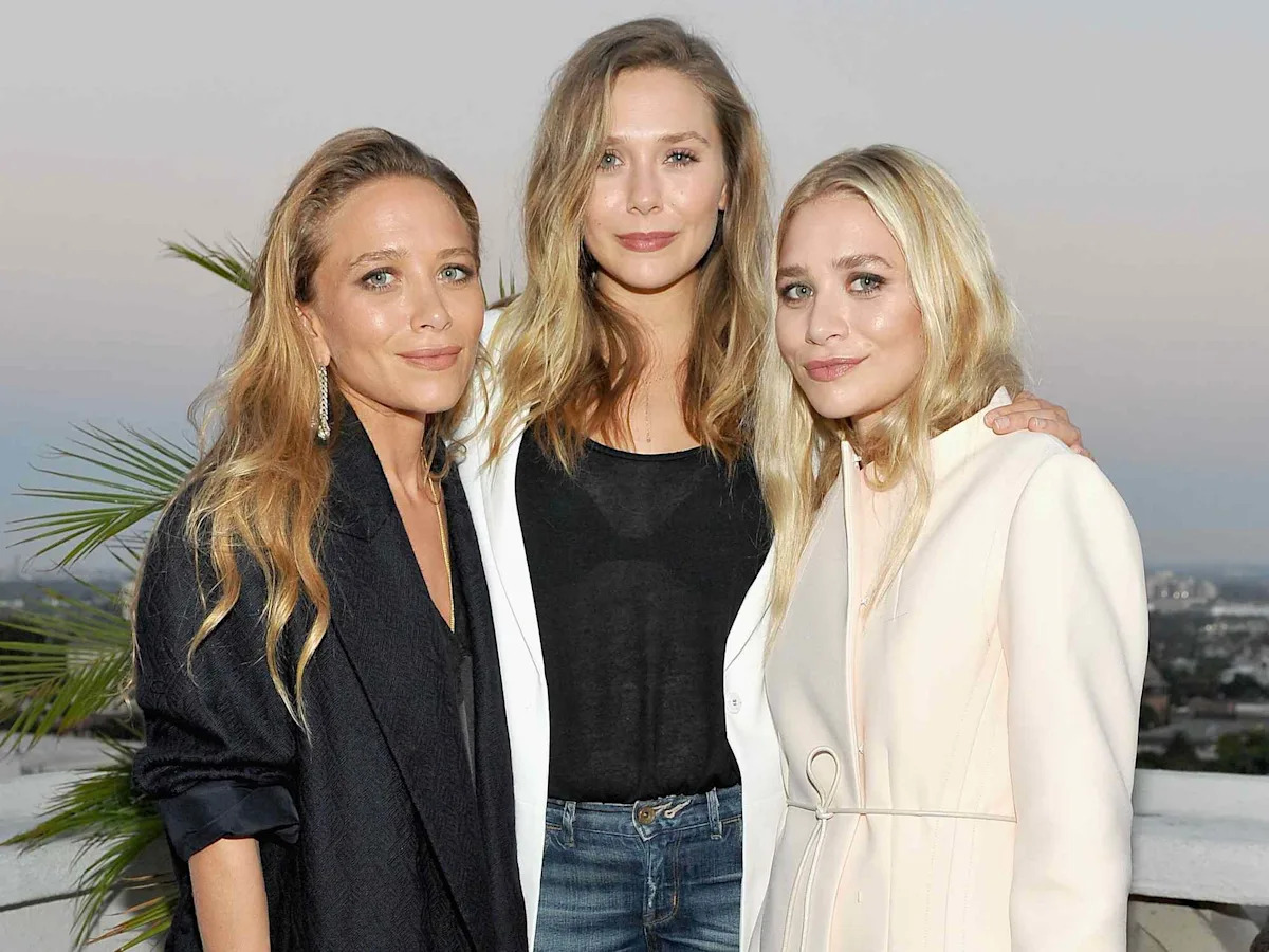Elizabeth Olsen says famous big sisters Mary-Kate and Ashley were 'forced to watch' her act