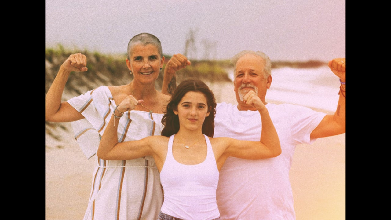 Liz Healy with her daughter, Ella, and husband, Jim.