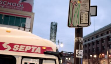 The digital real-time bus tracker that has been installed at the Route 64 bus stop on the northeast corner of Broad Street and Washington Avenue in Philadelphia on Sunday, Dec. 7, 2025.