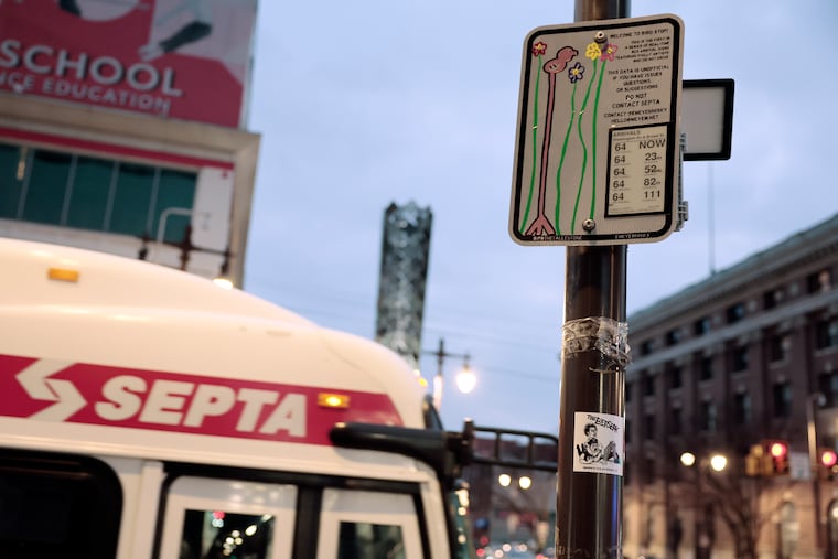 The digital real-time bus tracker that has been installed at the Route 64 bus stop on the northeast corner of Broad Street and Washington Avenue in Philadelphia on Sunday, Dec. 7, 2025.