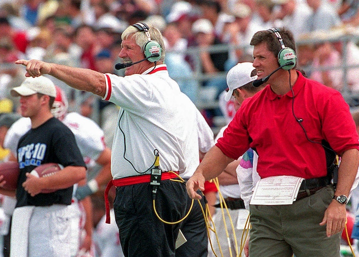 (Rick Egan | The Salt Lake Tribune) Kyle Whittingham coaches alongside his father, Fred, during a game against Washington State in 1999.