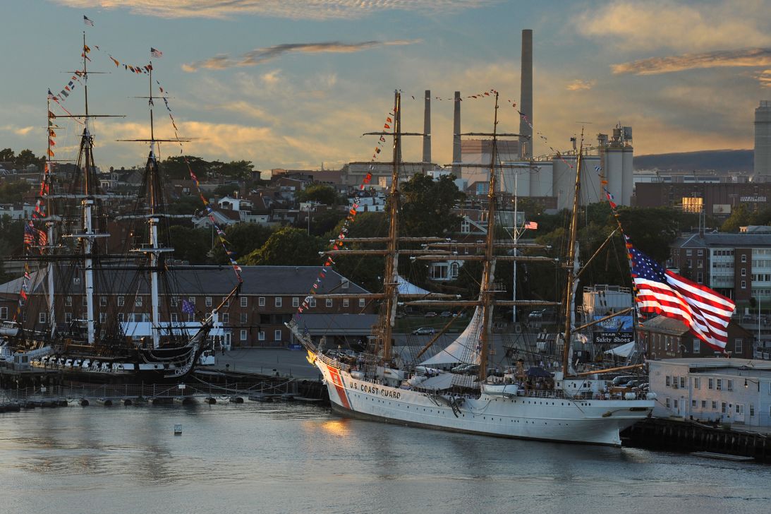 The Coast Guard Cutter Eagle is shown moored behind the USS Constitution.