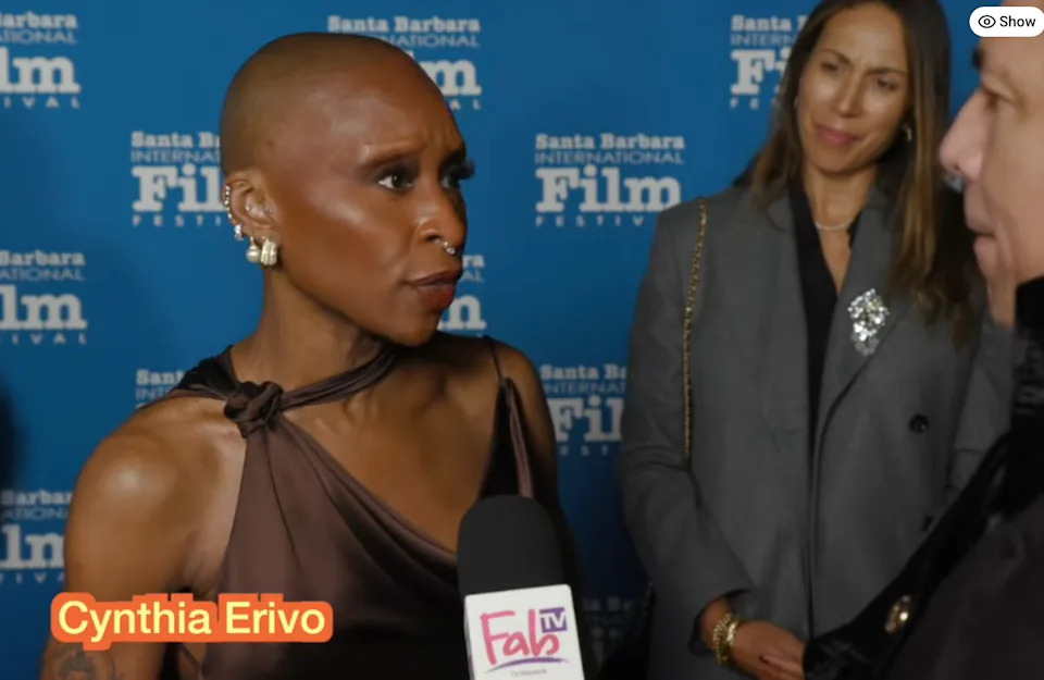 Cynthia being interviewed on a red carpet