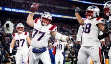 Patriots lineman Ben Brown spiked the ball after a touchdown catch by tight end Hunter Henry (not pictured) in the second quarter.