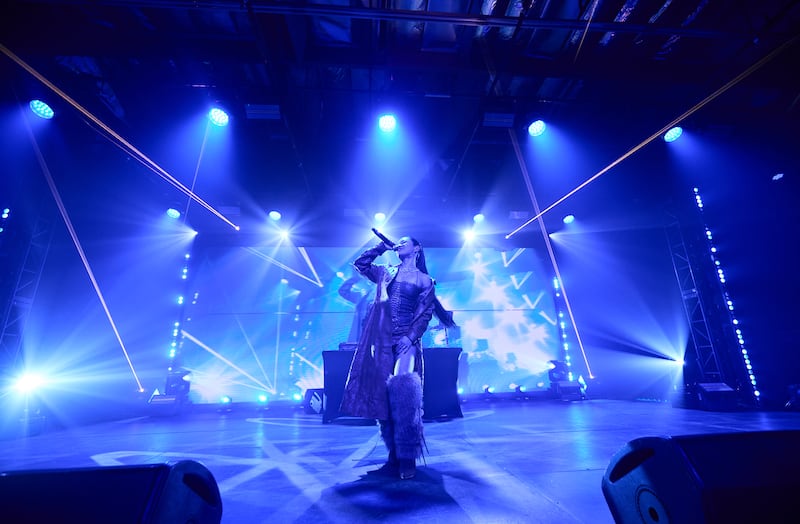 Artist perform with colorful lights