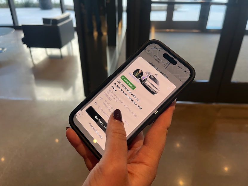 Annie Duvnjak, Uber's Global Head of Autonomous Mobility Operations, hails an autonomous...