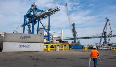 Holt Logistics' terminal in Gloucester City faces the company's cranes at PhilaPort across the Delaware River.