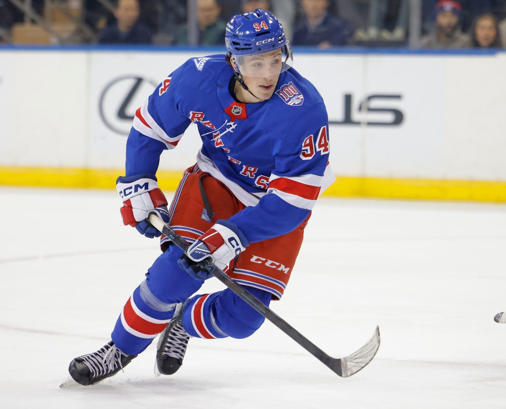 New York Rangers right wing Gabe Perreault (94) skates down ice.