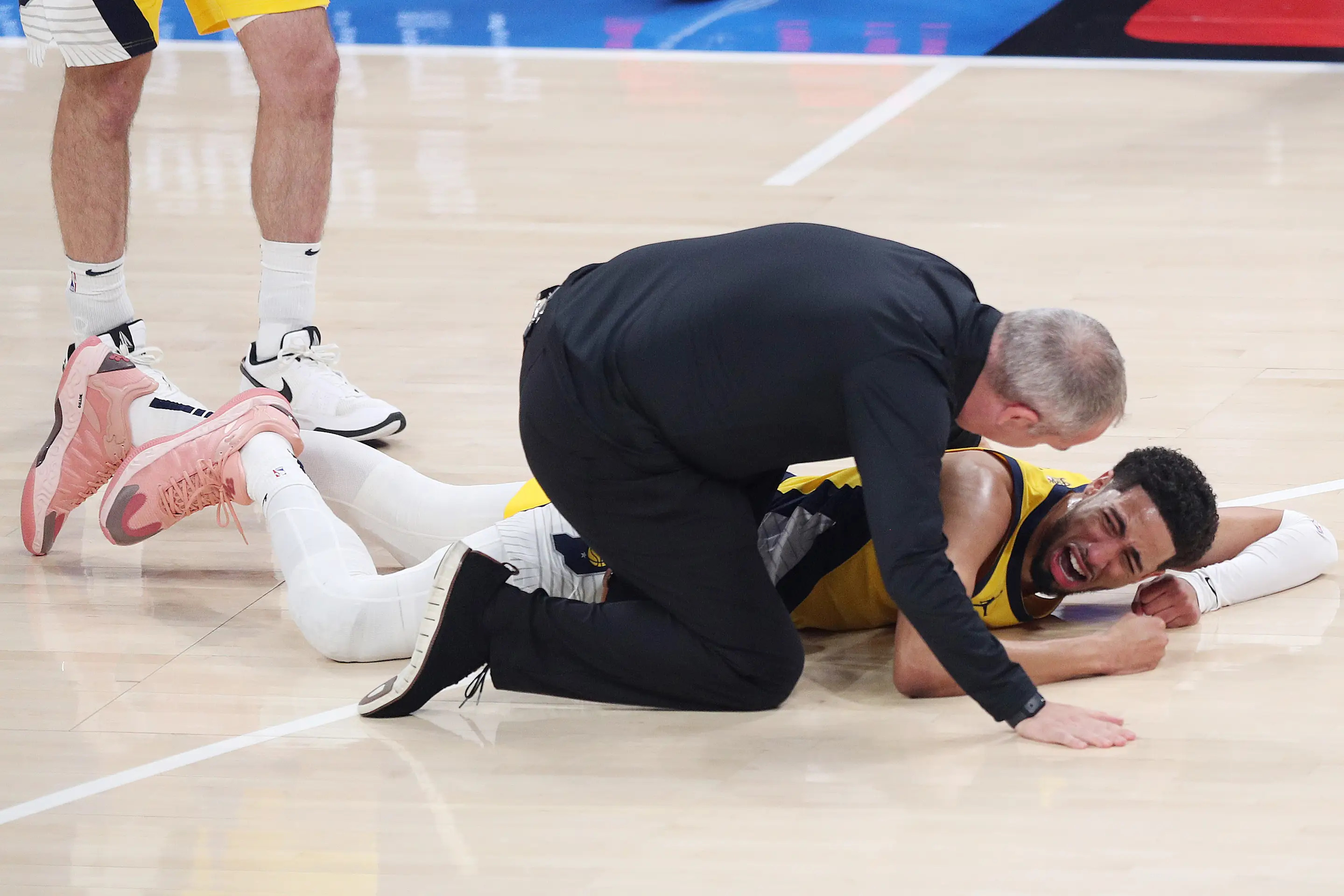 OKLAHOMA CITY, OKLAHOMA - JUNE 22:  Tyrese Haliburton #0 of the Indiana Pacers sustains an injury during the first quarter against the Oklahoma City Thunder in Game Seven of the 2025 NBA Finals at Paycom Center on June 22, 2025 in Oklahoma City, Oklahoma. NOTE TO USER: User expressly acknowledges and agrees that, by downloading and or using this photograph, User is consenting to the terms and conditions of the Getty Images License Agreement. (Photo by Justin Ford/Getty Images)