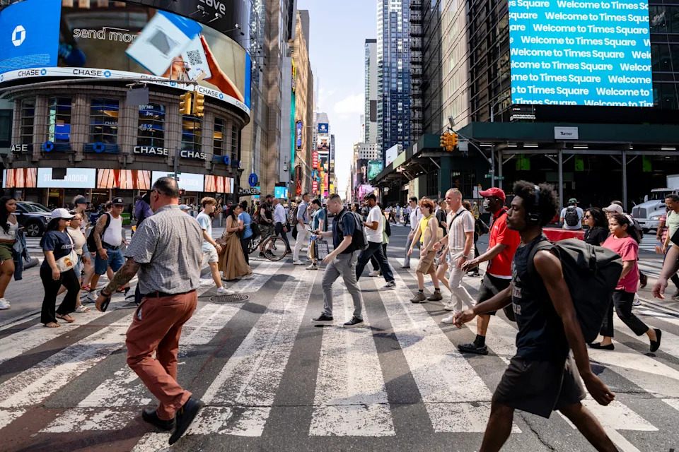 New Yorkers cross 42nd Street and 7th Avenue in Times Square on Primary Election Day. (Craig T Fruchtman/Getty Images)