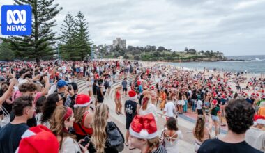 Revellers swarm Coogee Beach for Christmas Day celebrations after Bronte Beach off-limits