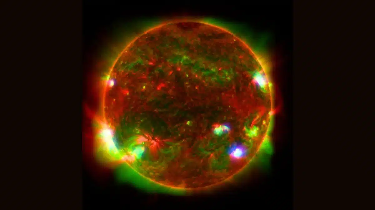 A Multi Wavelength Image Showing The Sun In Three Distinct Colors.