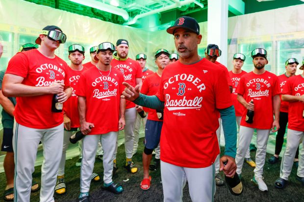 Boston Red Sox manager Alex Cora speaks in the locker room after the team defeated the Detroit Tigers on Friday, Sept. 26 in Boston. (AP Photo/Greg M. Cooper)