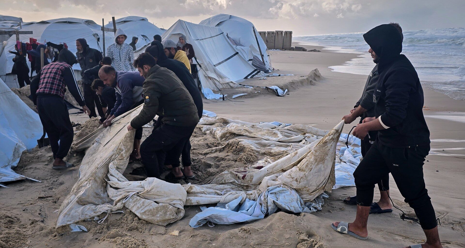 Winter floods wreak havoc on Gaza displacement camps as Israel blocks aid | Gaza News