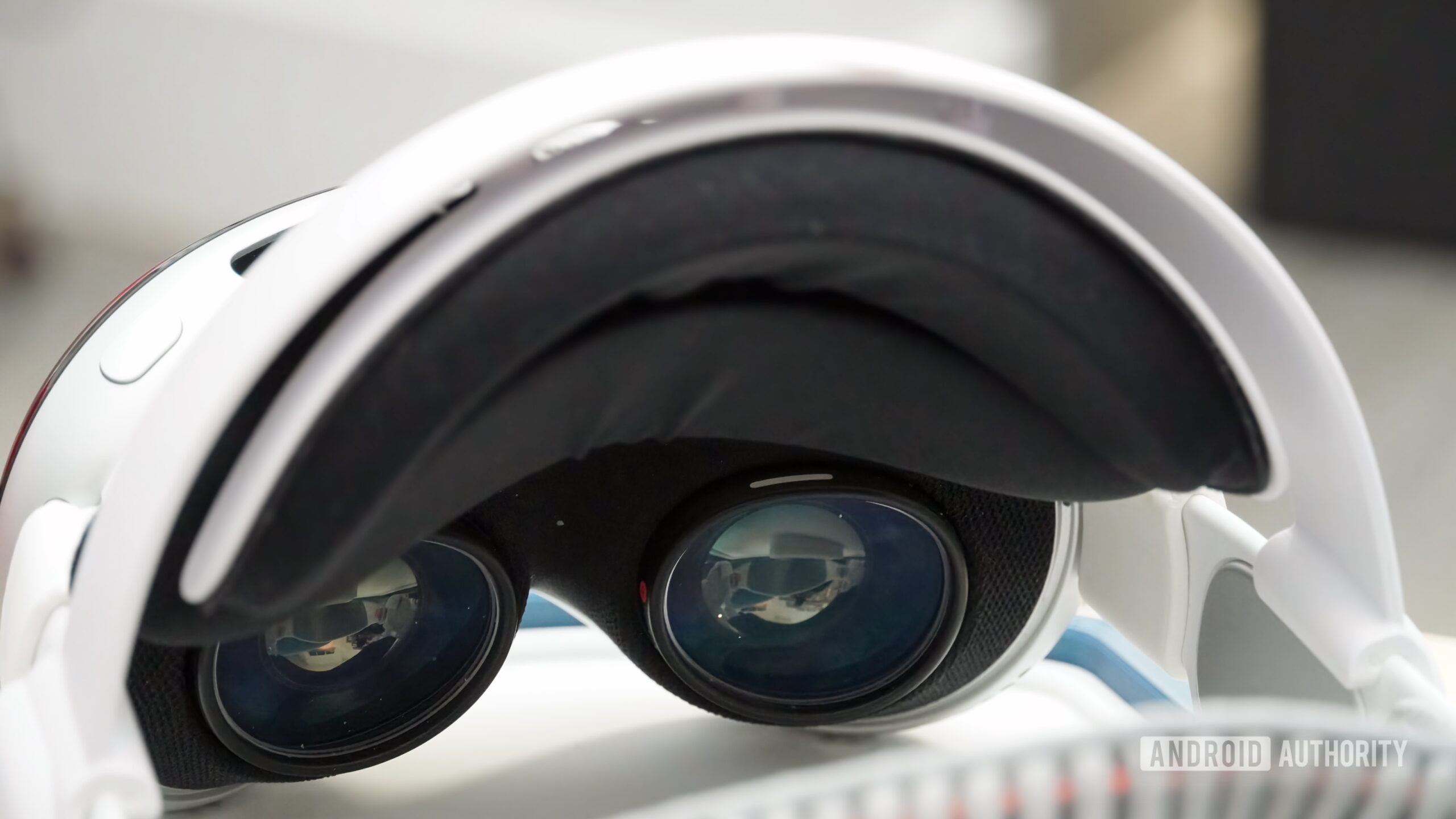 Two third-party head straps and facial interfaces for Apple Vision Pro.