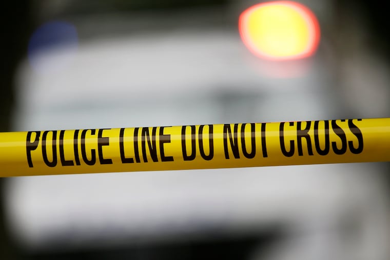 Police tape at crime scene.