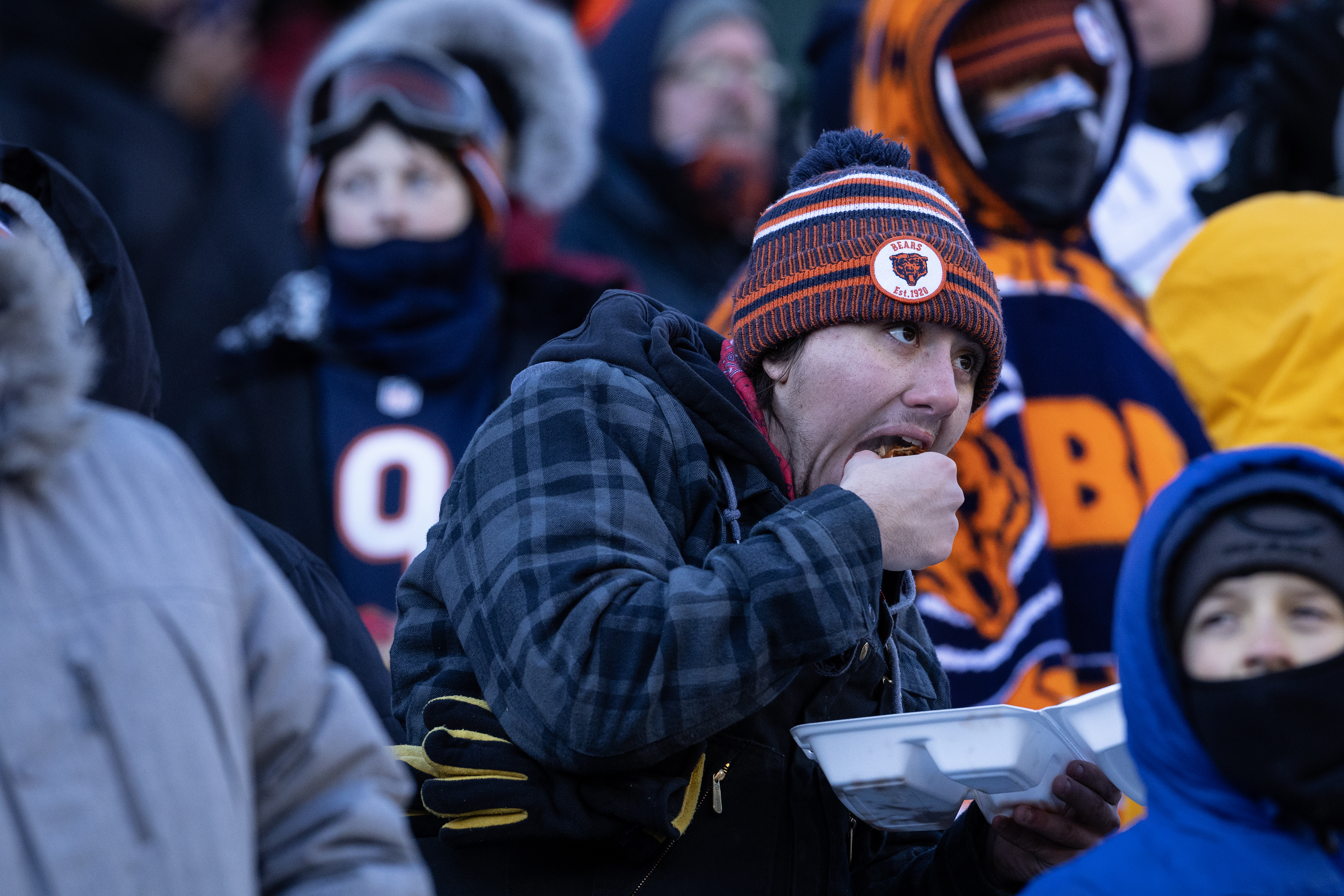 Chicago Bears fans brave the frigid temperatures during the Bearsâ...
