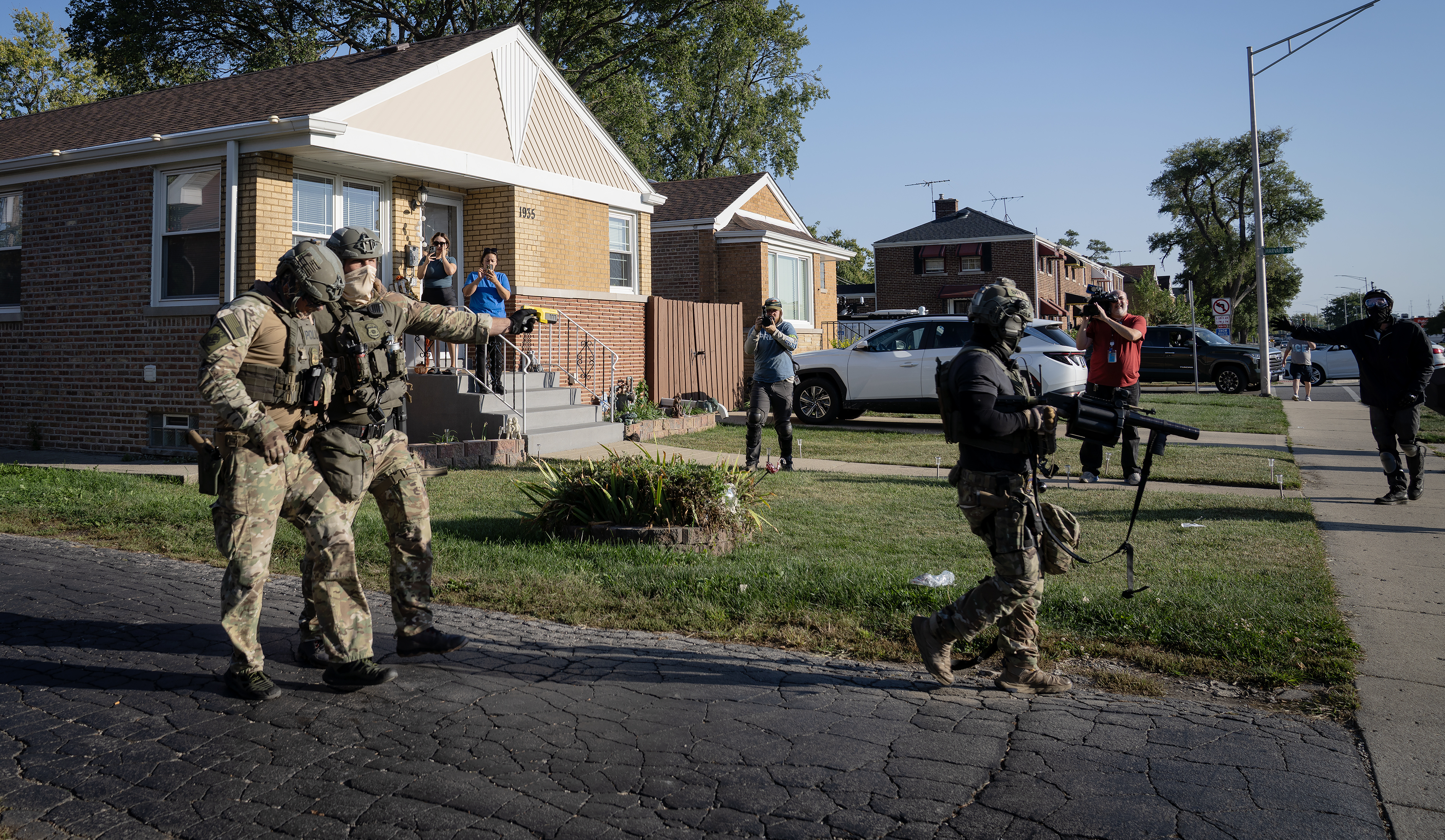 ICE agents help an injured colleague after chasing a protester...