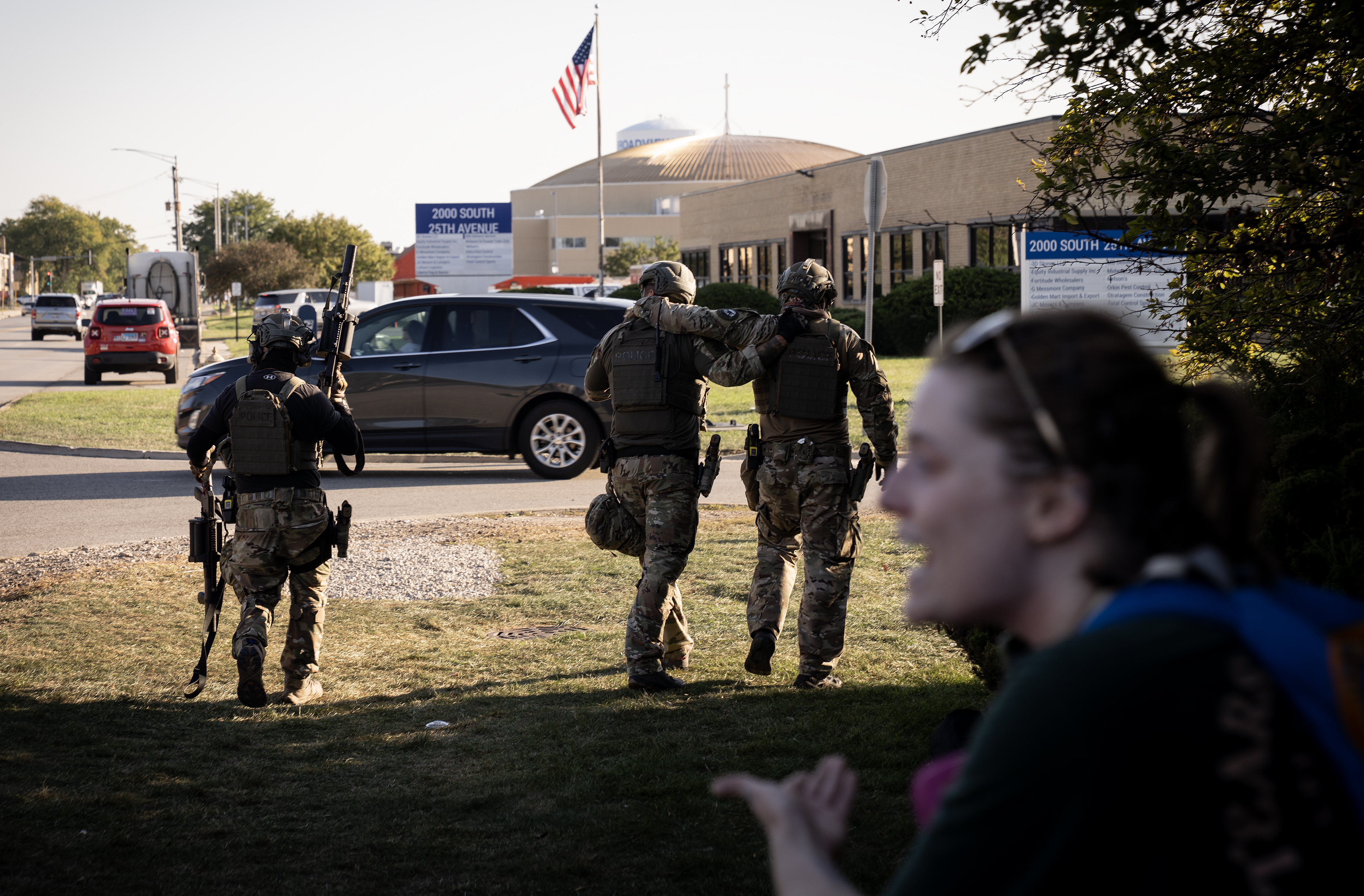 U.S. Immigration and Customs Enforcement agentsÂ help an injured colleague after...