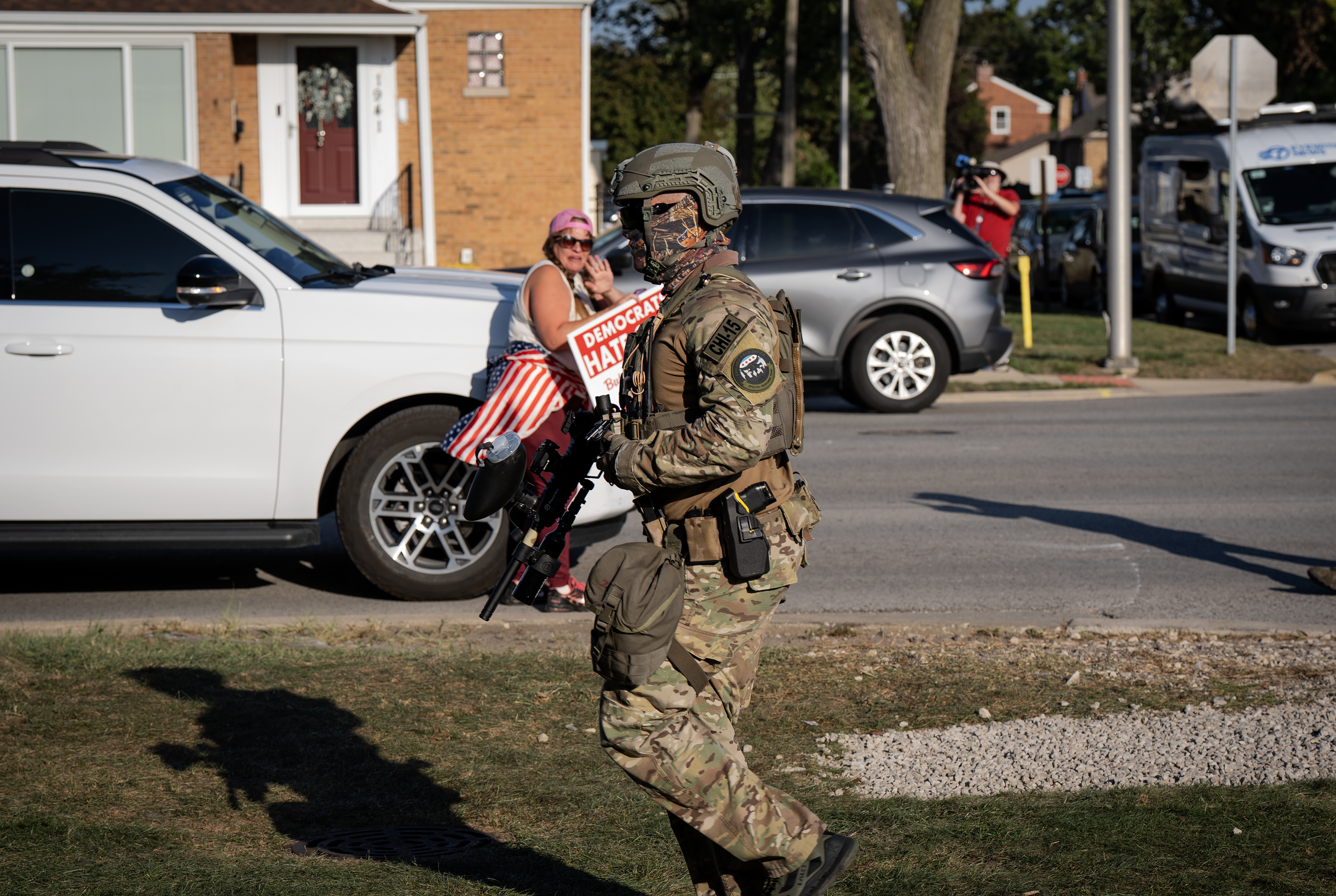 Protesters flinch as ICE agents fire rounds at them in...
