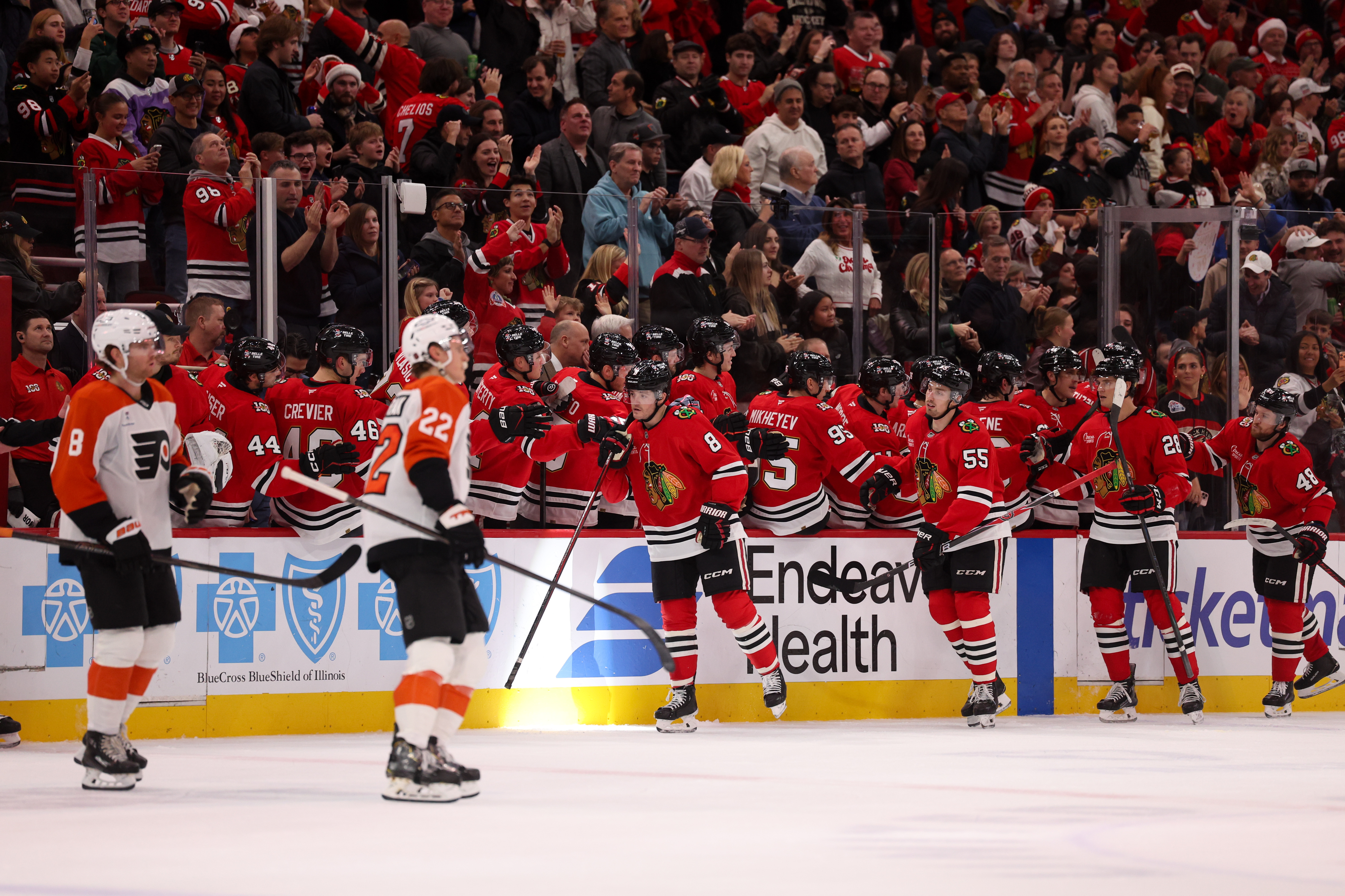Chicago Blackhawks center Ryan Donato (8) celebrates with his team after scoring a goal during the second period against the Philadelphia Flyers at the United Center Tuesday Dec. 23, 2025 in Chicago. (Armando L. Sanchez/Chicago Tribune)