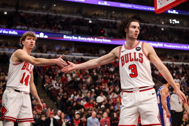 Chicago Bulls forward Matas Buzelis and Chicago Bulls guard Josh Giddey high-five during a game against the Philadelphia 76ers on Friday, Dec. 26, 2025, at the United Center in Chicago. (Dominic Di Palermo/Chicago Tribune)