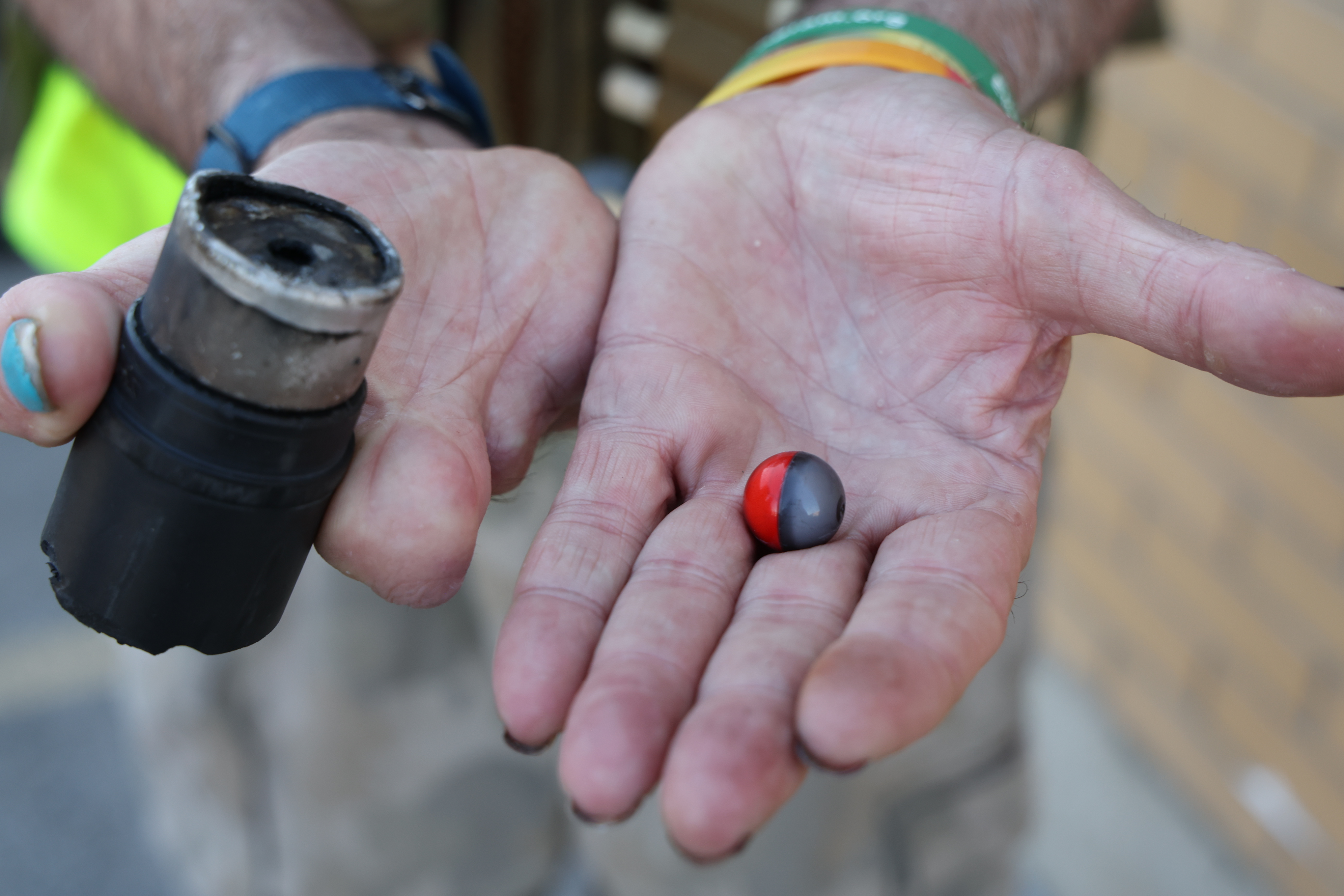Baton rounds fired toward protesters outside the U.S. Immigration &...