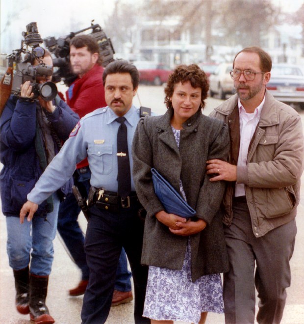 David and Sharon Schoo leave the Kane County Courthouse on Jan. 12, 1993, after appearing before Judge John L. Petersen and filing a motion for a gag order, which was denied. (Bill Hogan/Chicago Tribune)