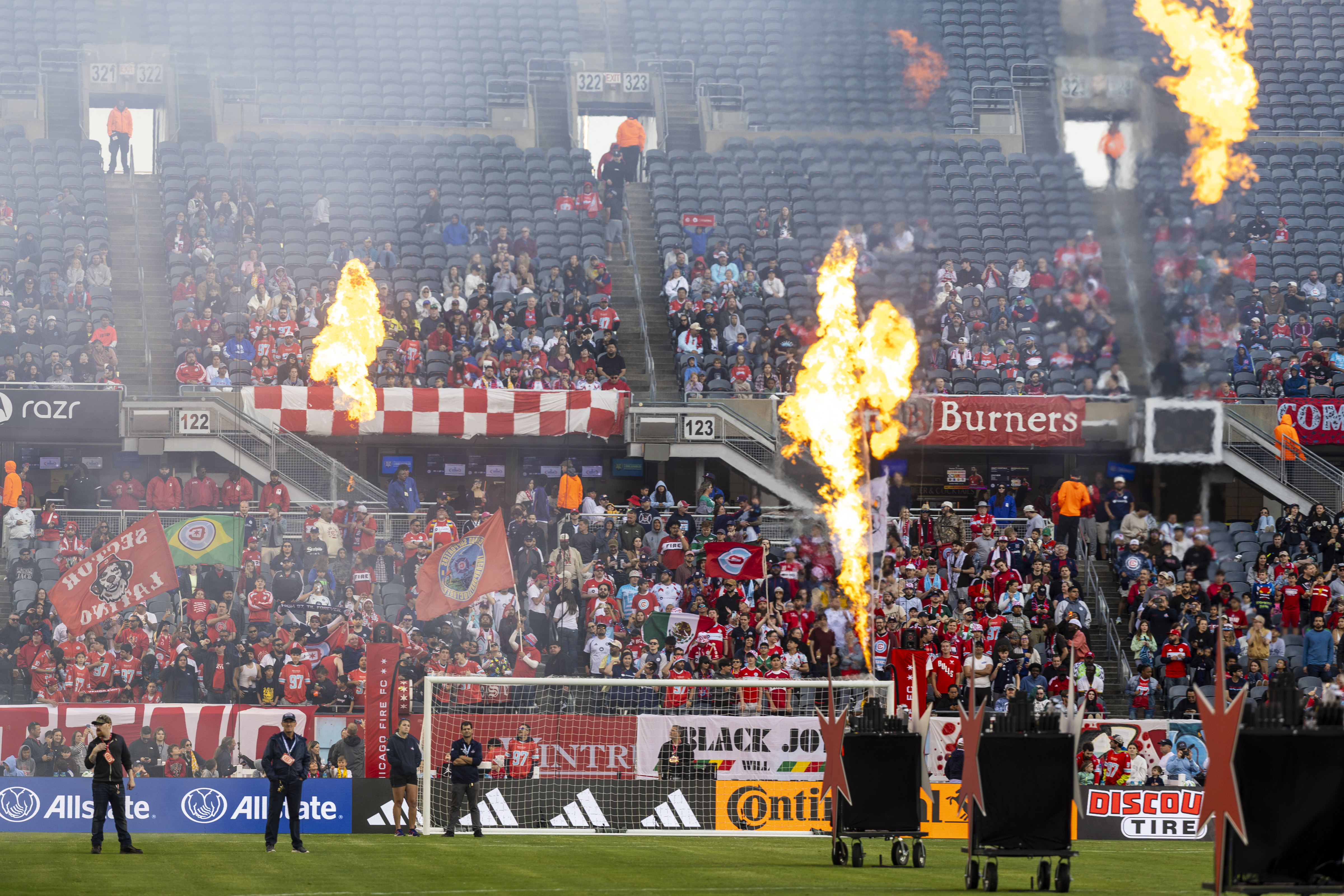 Pyrotechnics light up during pregame festivities as the Fire take...