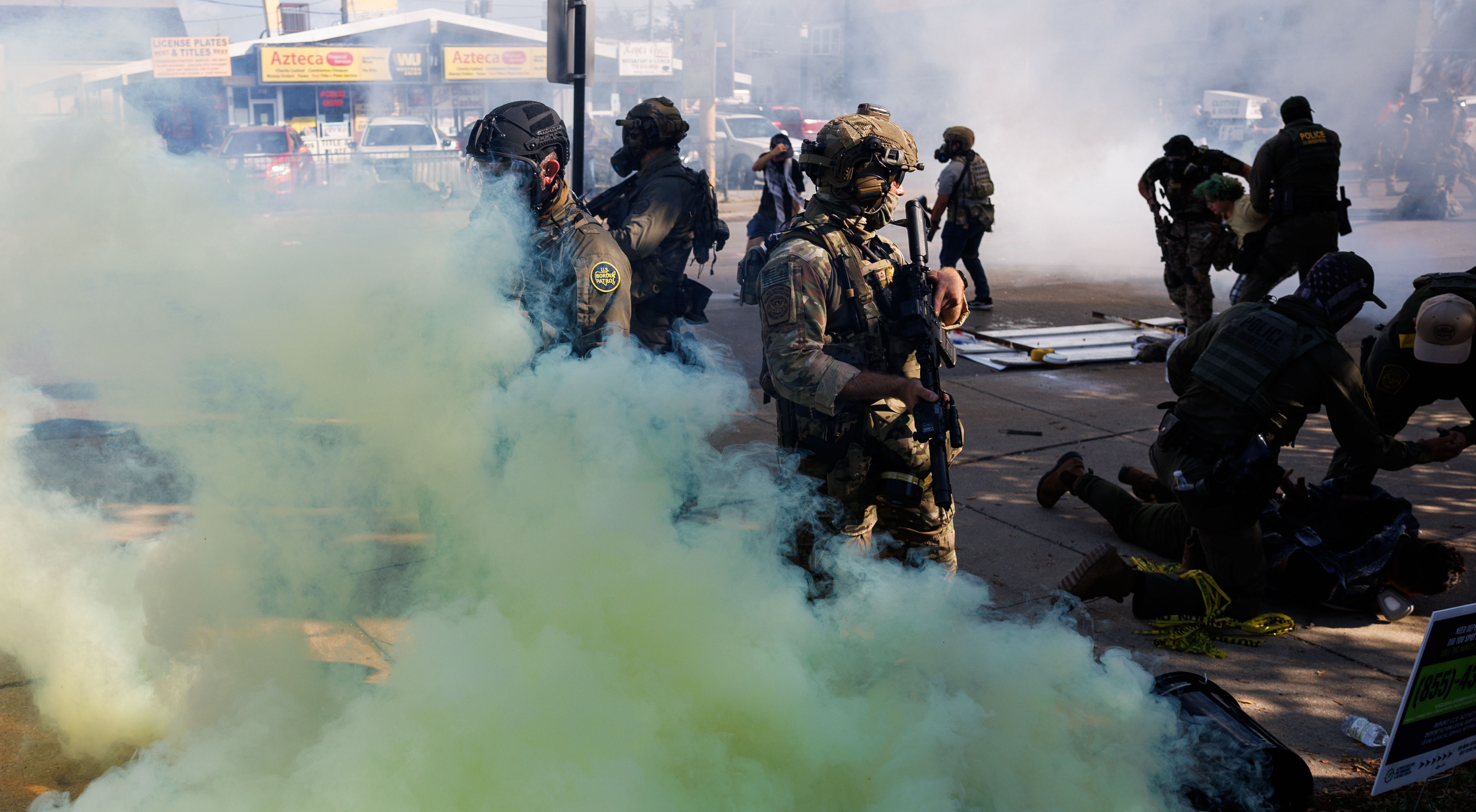 Federal agents use tear gas and smoke on community members...