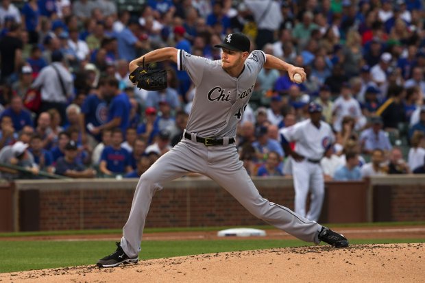 Chicago White Sox starting pitcher Chris Sale (49) throws during the first inning of a game against the Chicago Cubs at Wrigley Field on July 28, 2016, in Chicago. (Erin Hooley/Chicago Tribune)