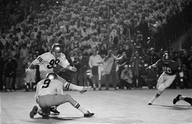 Notre Dame kicker Bob Thomas puts his best toe forward on a 19-yard field goal to give the Irish a 24-23 upset victory in the Sugar Bowl against Alabama in New Orleans on Jan. 1, 1973. Holding is Brian Doherty. (JW/AP)