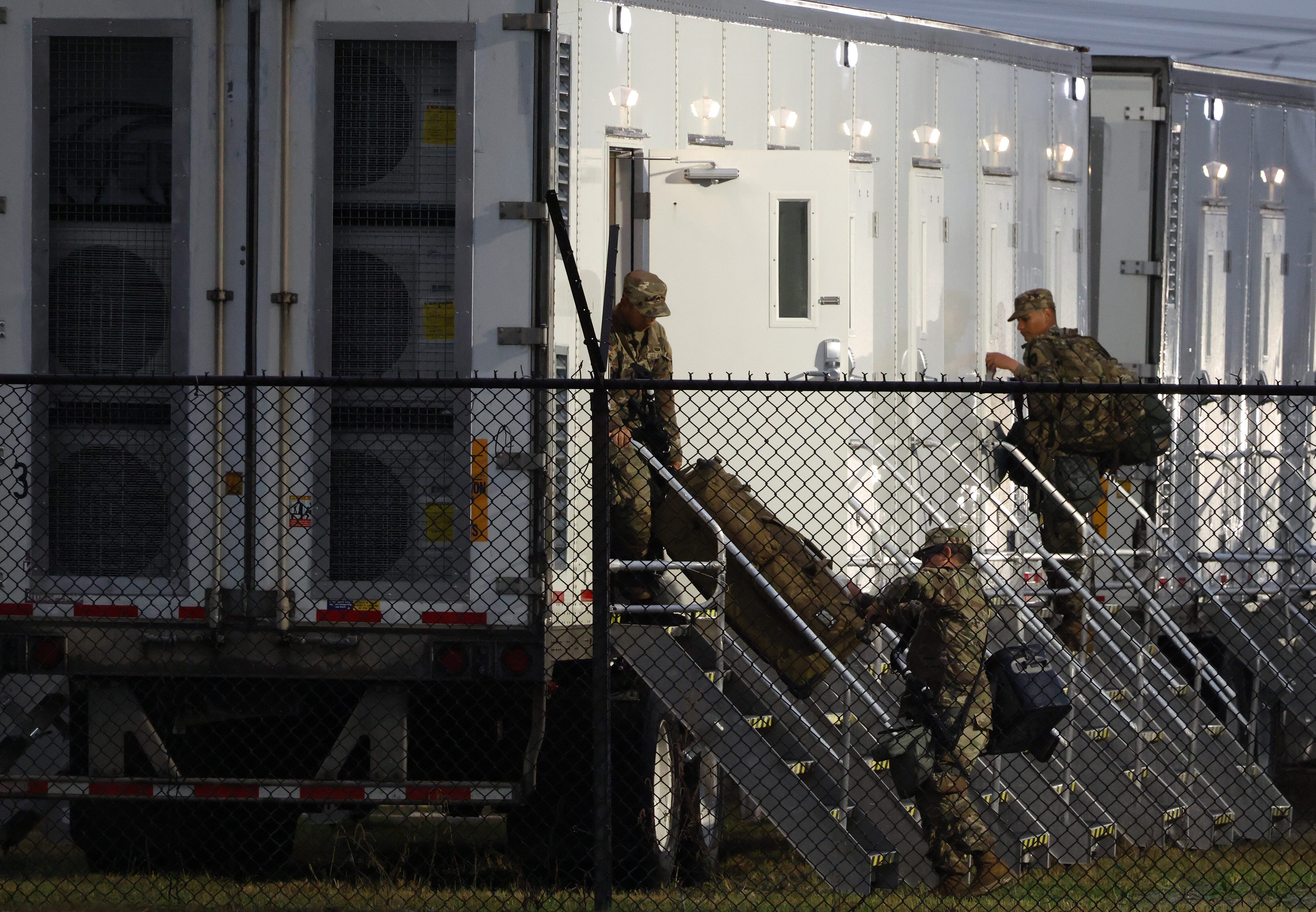 Members of the Texas National Guard assemble at the Army...