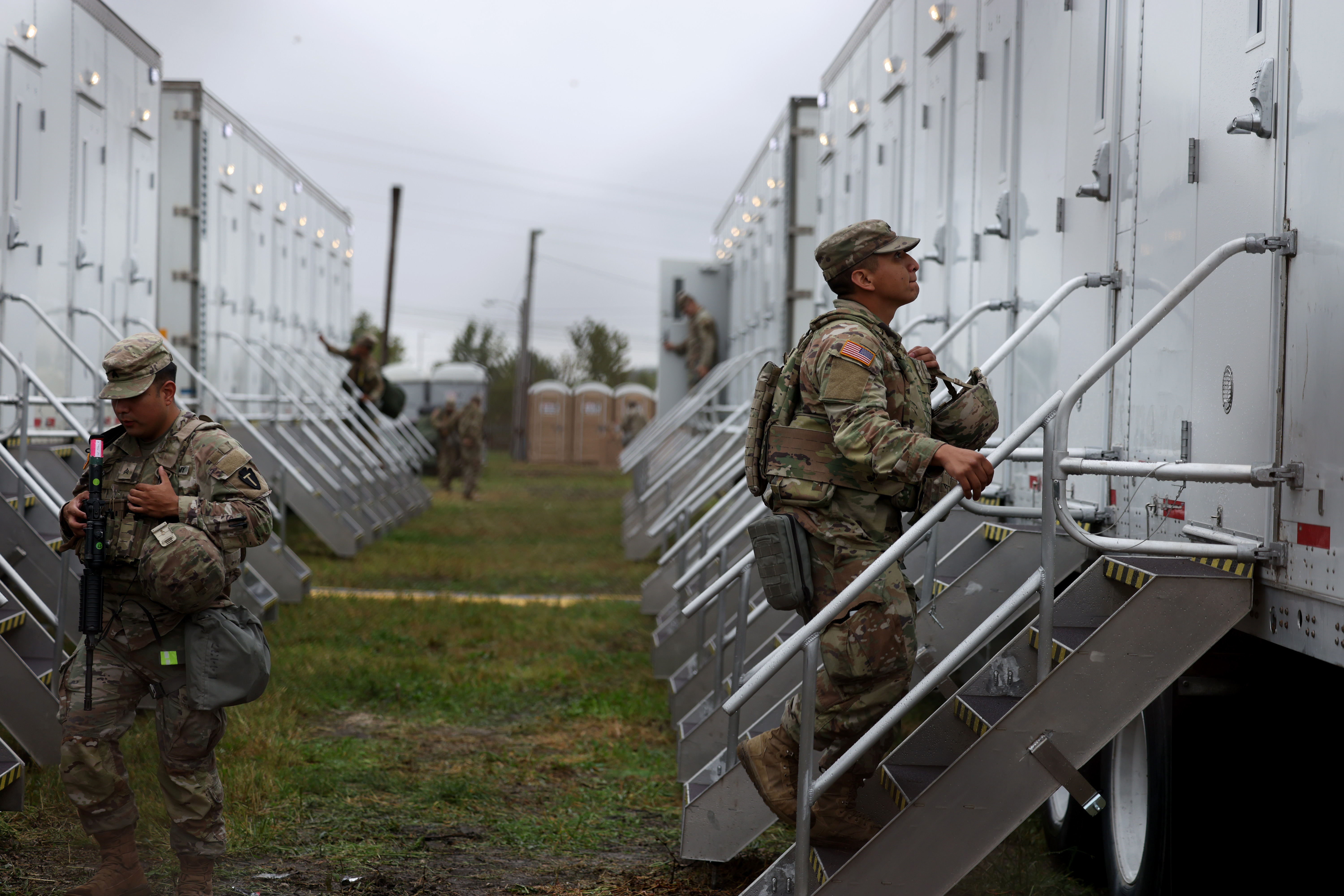 Members of the Texas National Guard assemble in Elwood at...