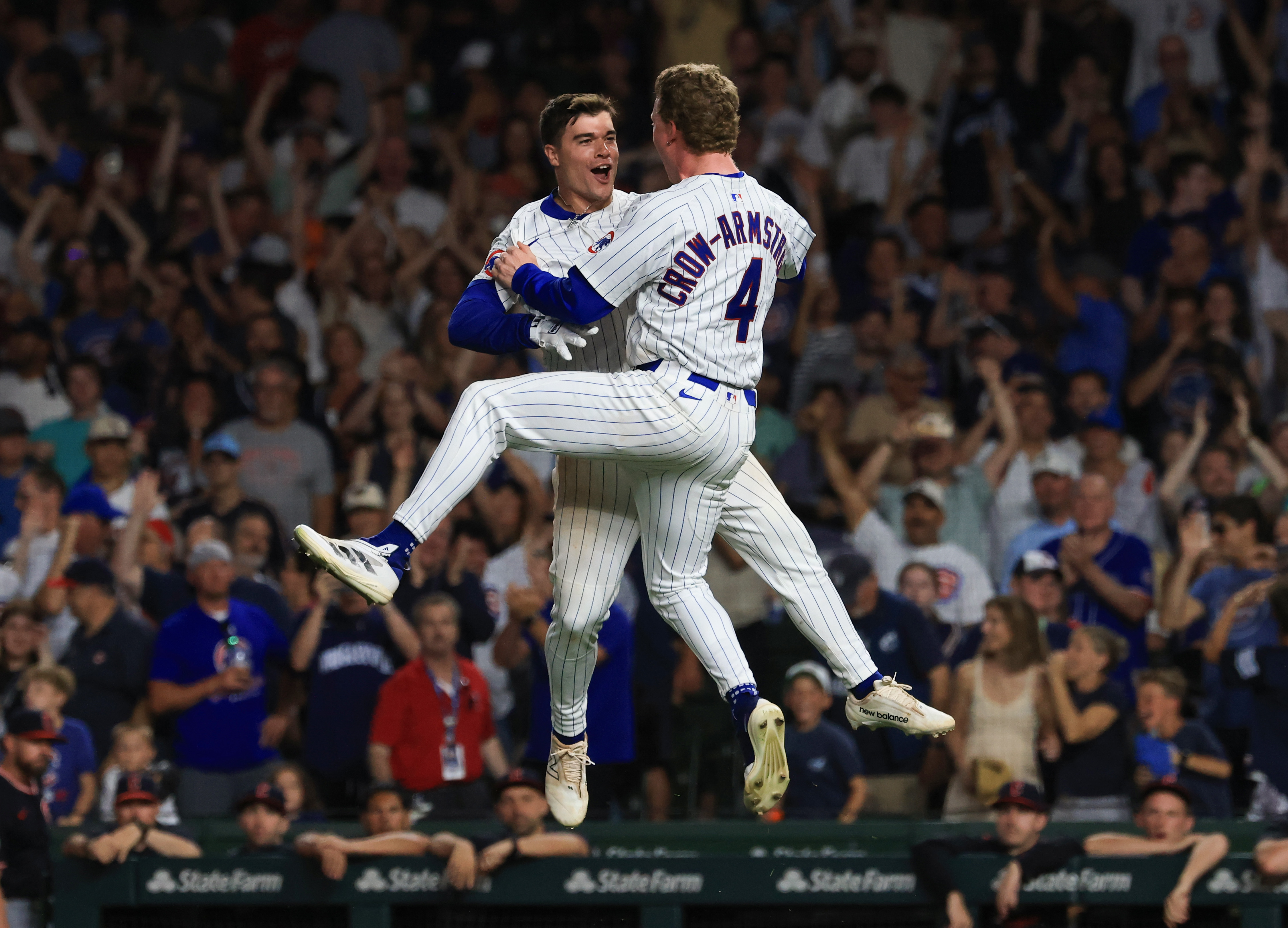 July 3: Cubs third baseman Matt Shaw, left, and center...