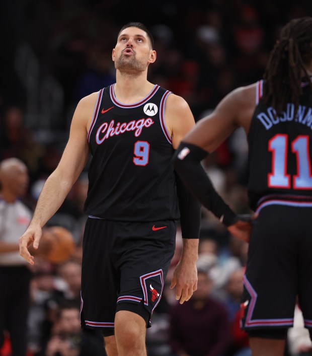 Bulls center Nikola Vučević (9) reacts on the floor in the second half against the Nets on Dec. 3, 2025, at the United Center. (Chris Sweda/Chicago Tribune)