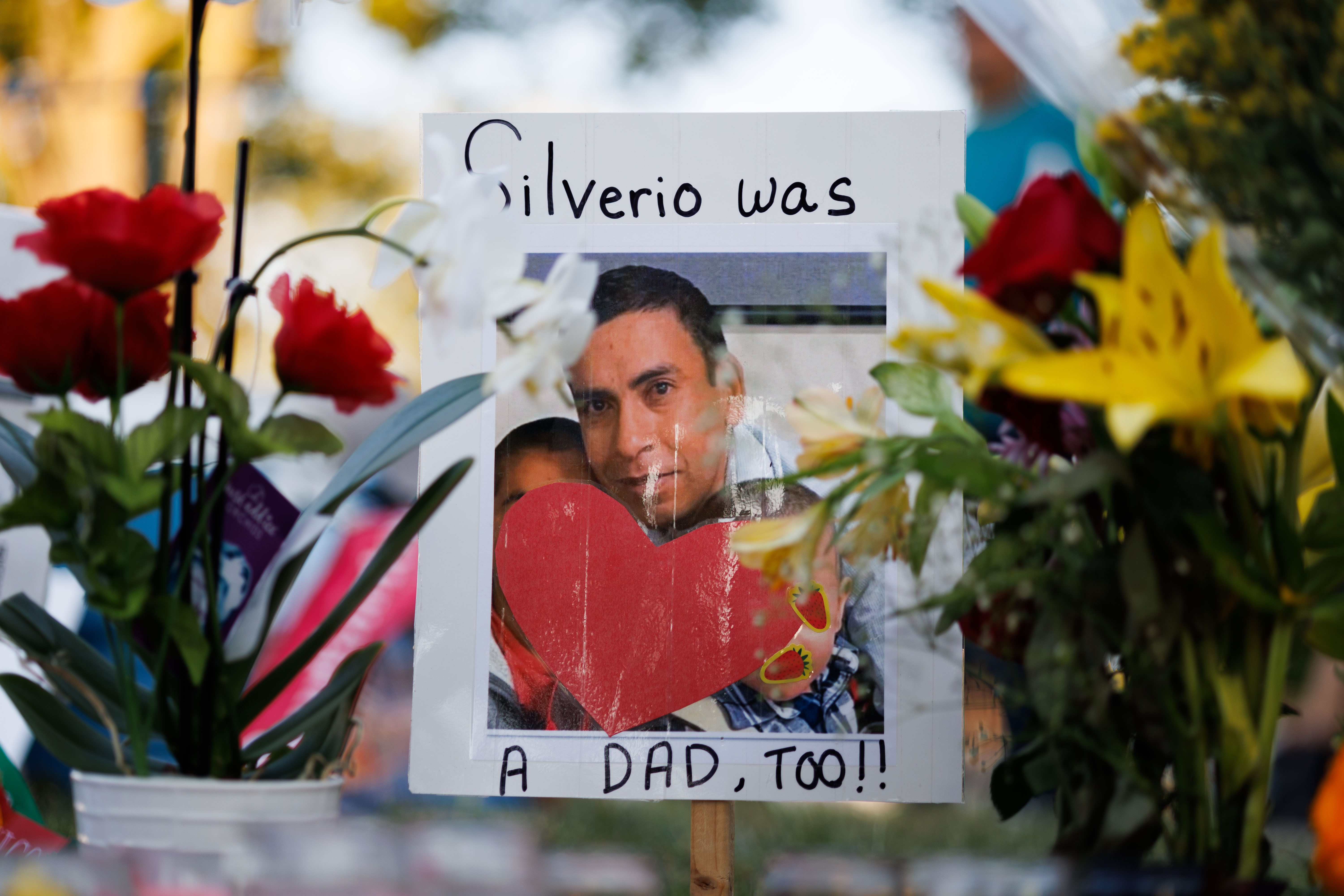Flowers are displayed near a memorial on Sept. 15, 2025,...