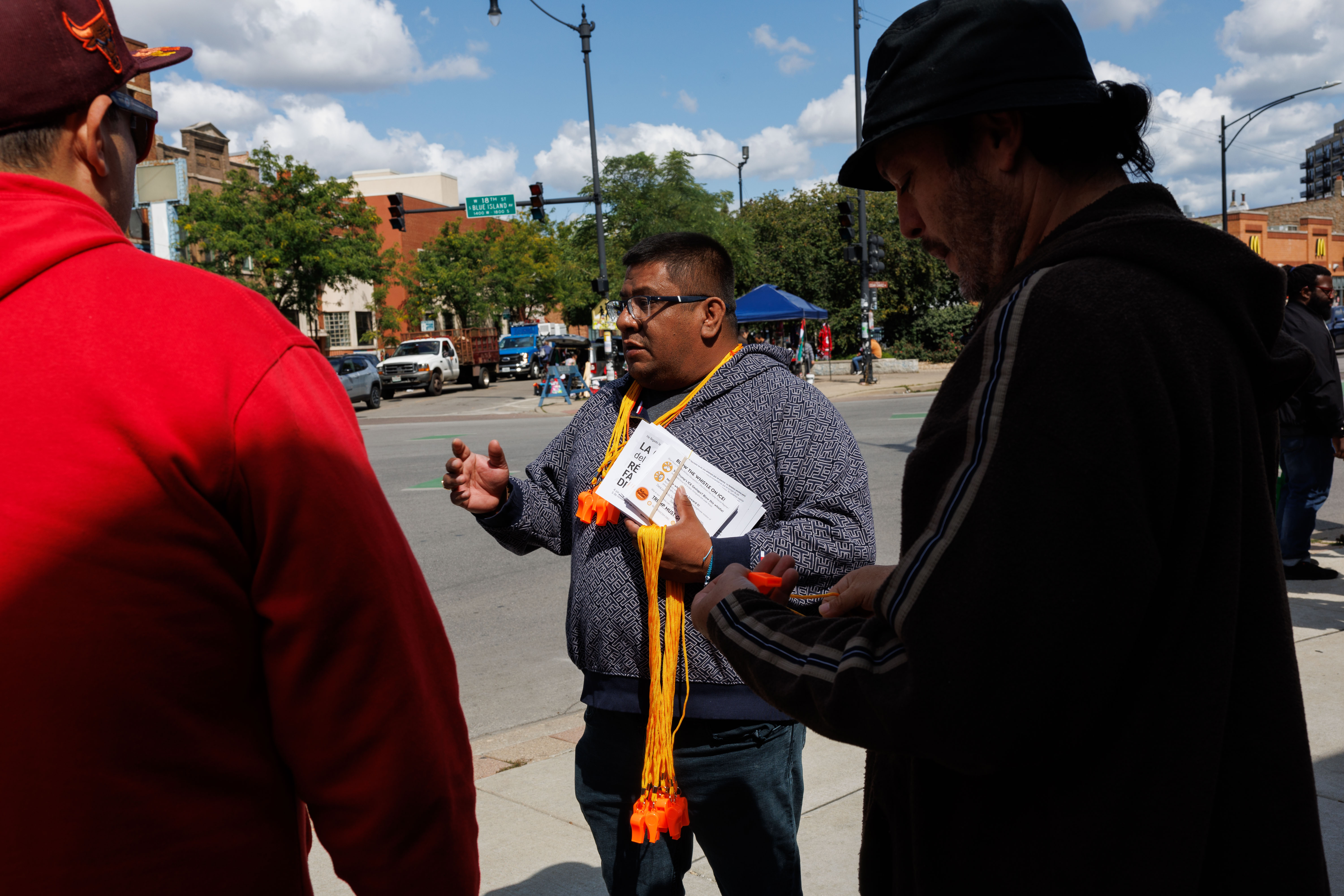 Baltazar EnrÃ­quez, center, president of the Little Village Community Council,...