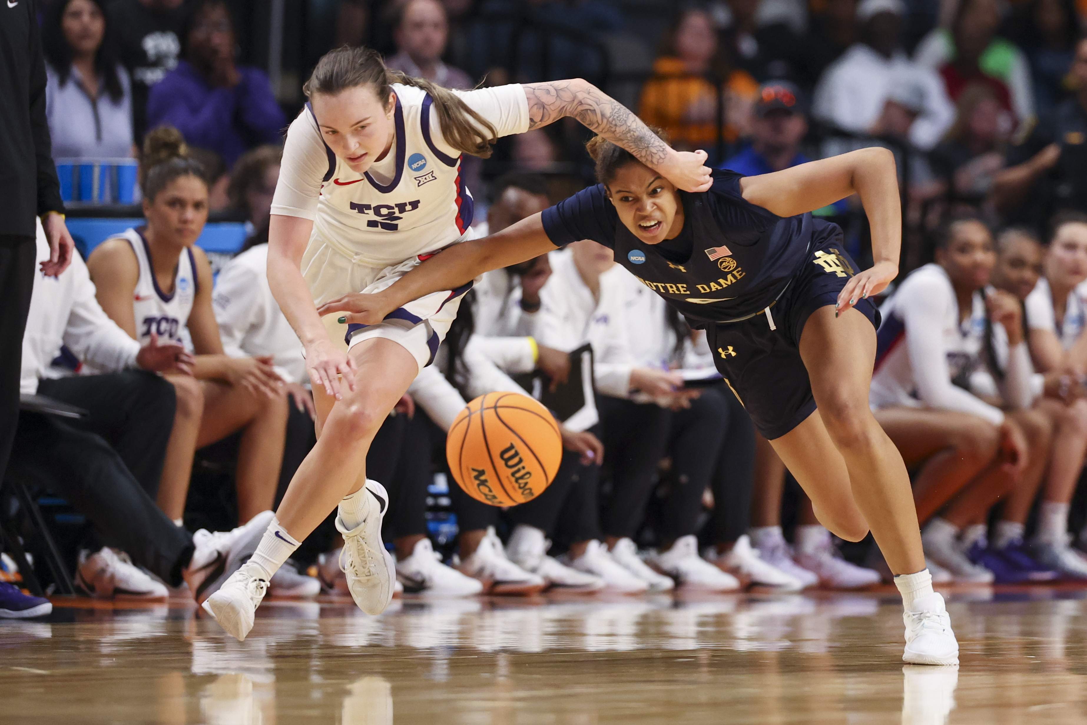 Notre Dame Fighting Irish guard Cassandre Prosper (8) battles TCU...