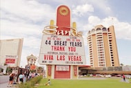 People walk past the Sands Hotel marquee thanking everyone for 44 years of operation on June...
