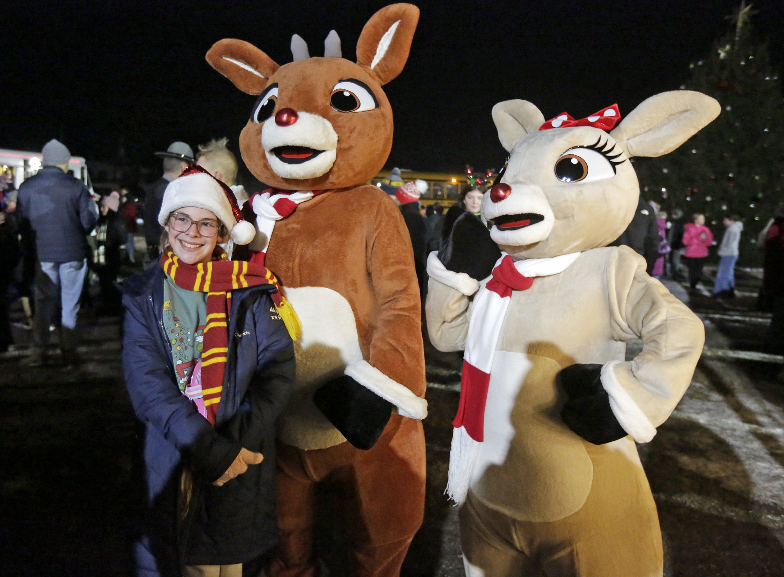 Addyson Rusonis, 11, of Dalas, left, poses for a photo...