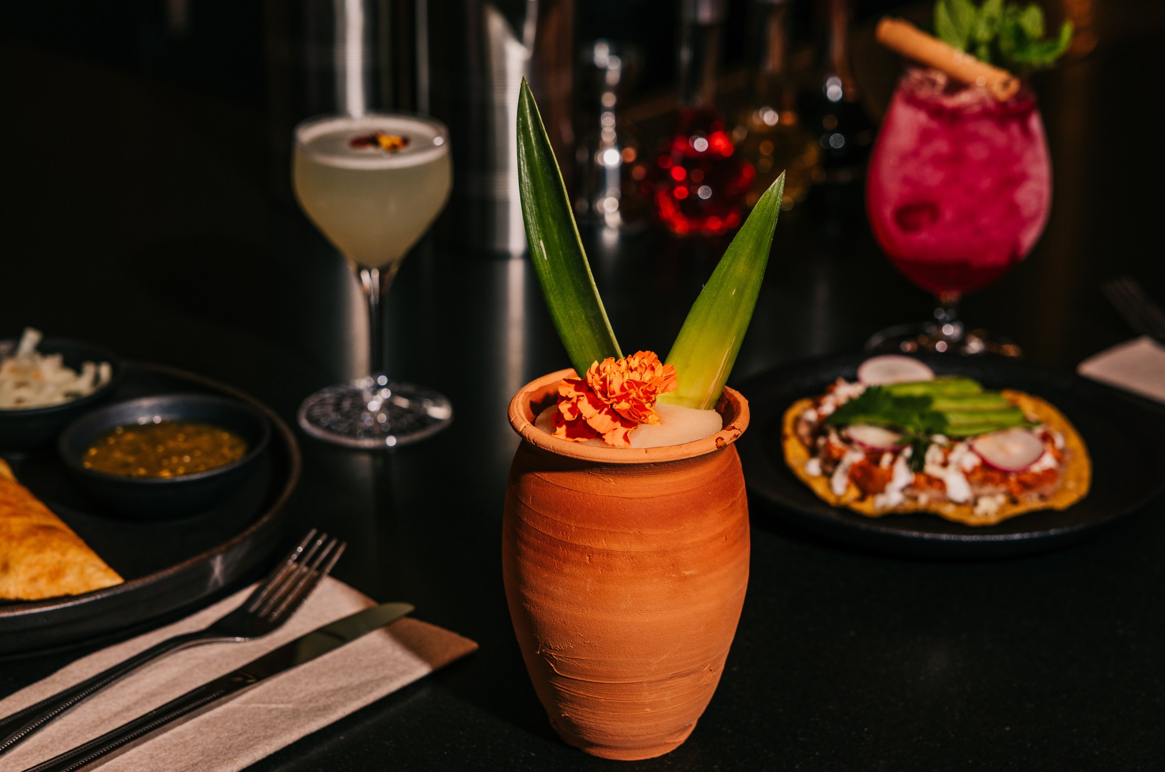 A tropical drink in a cantarito mug.