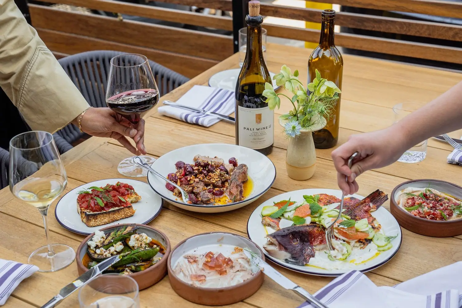 Food from San Diego restaurant Cellar Hand in Hillcrest offering a Seven Fishes Christmas dinner in 2025