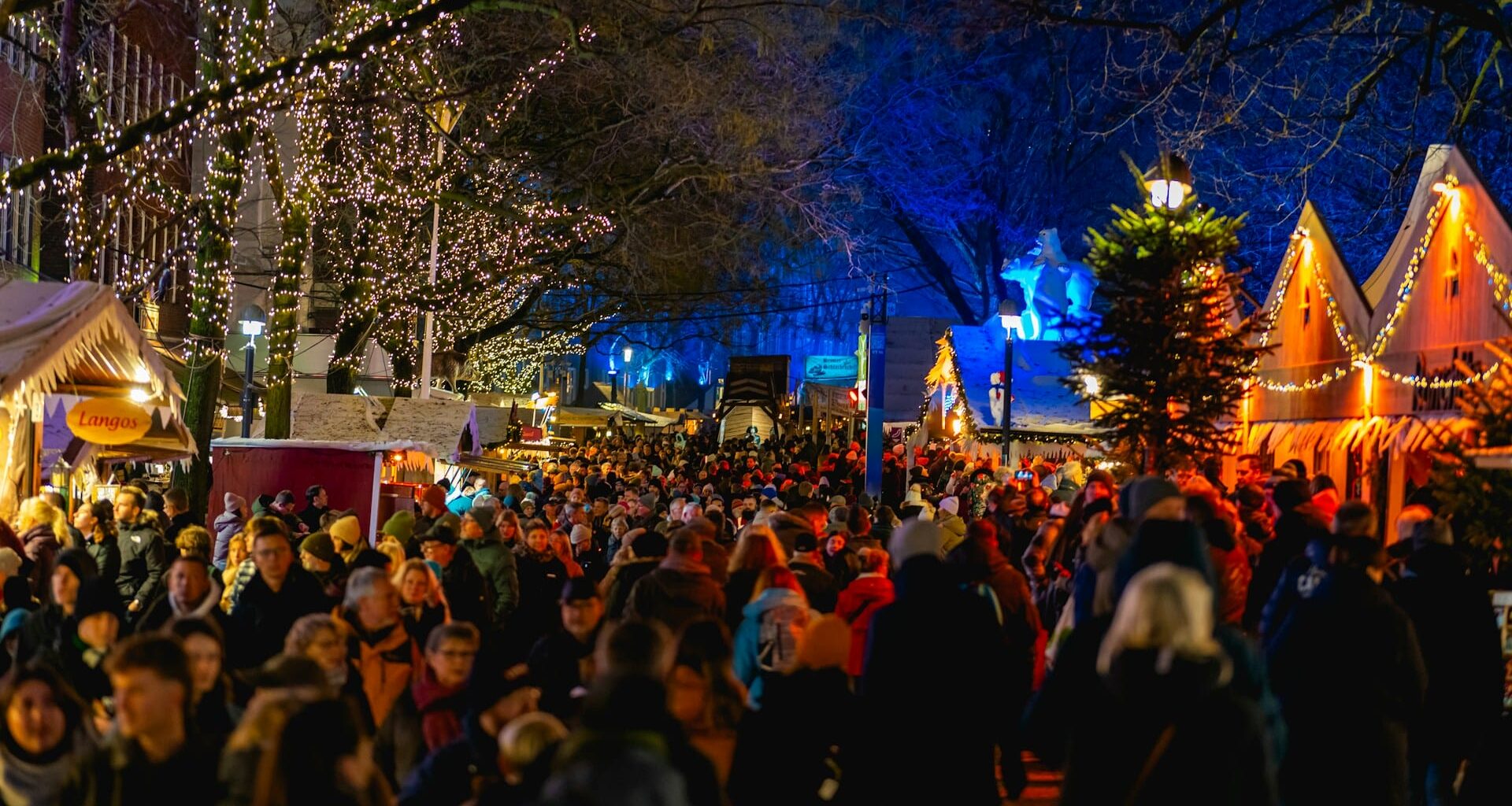 Christmas consumerism: crowds gather at Christmas market