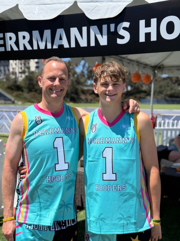 Scott and Camden Hall lead Herrmann's Hoopers team in the Curebound Cancer Challenge. (Courtesy the Hall family)